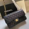 This is CHANEL Caviar Quilted Small Double Flap in Black. This shoulder bag is crafted of luxurious diamond-quilted caviar leather in black.
